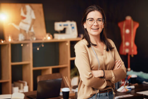 Middle-age woman working on her own fashion business | Mortgage Loans Your Self-Employed Customers | DG Pinnacle TPO - Miami Wholesale Mortgage