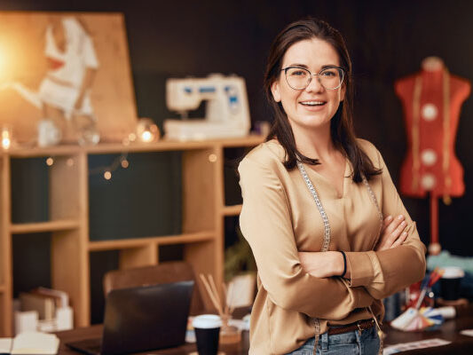 Middle-age woman working on her own fashion business | Mortgage Loans Your Self-Employed Customers | DG Pinnacle TPO - Miami Wholesale Mortgage