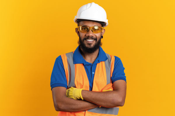 Young afroamerican independent contractor with helmet smiling | Mortgage Loans Your Self-Employed Customers | DG Pinnacle TPO - Miami Wholesale Mortgage