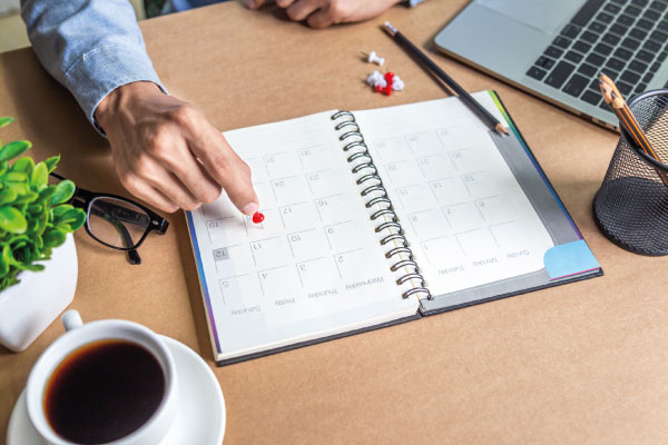 Businnessman agenda calendar and schedule | 5 Ways to Avoid Burnout as a Loan Officer | DG Pinnacle TPO - Wholesale Division | Miami Mortgage Lender