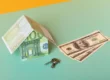 Model house with made with dollar bills next to a pair of keys | 5 money tips to share with your borrowers | DG Pinnacle TPO - Miami Wholesale Mortgage Funding Lender