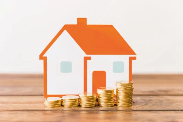 Model house with some coins around | 5 money tips to share with your borrowers | DG Pinnacle TPO - Miami Wholesale Mortgage Funding Lender